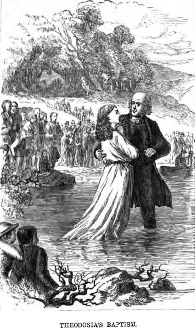 Young woman being baptized by immersion in a river.